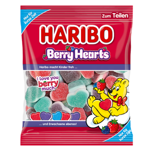 Pose med Haribo Berry Hearts 175 g – bløde frugtgummi hjerter med intens bærsmag i røde, lilla og turkise farver. Slikket har en sukkeret overflade og en dejlig blanding af jordbær-, hindbær- og brombærsmag, perfekt til både børn og voksne. Ideel som hyggeslik, til deling eller som sød gave. Begrænset udgave. Produktet er på lager og klar til hurtig levering – køb og spar hos os.