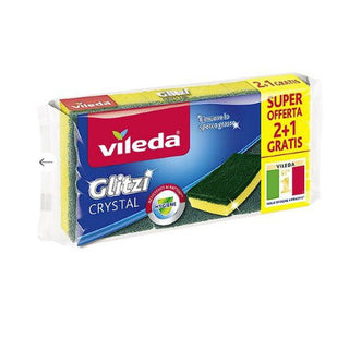 Vileda Glitzi Krystal skuresvampe i 2+1-gratis pakke, vist i original emballage med grøn-gul krystalstruktur, der giver ekstra slibeeffekt til hårdt, fastbrændt snavs på gryder, pander og kogeplader. Antibakteriel behandling reducerer bakterievækst og dårlig lugt, hvilket holder svampen frisk længere. Kraftig rengøringssvamp i høj kvalitet, ideel til køkken og hjemmerengøring. Findes hos Købogspar med hurtig levering.