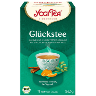 Yogi Tea Glückstee Økologisk 17 breve – koffeinfri urtete med kanel, humle og appelsinskal. Økologisk og vegansk yogi te med varm, let krydret og frugtig smag, skabt til ro, lykke og velvære i hverdagen. Ayurvedisk teblanding med naturlig sødme og harmonisk balance mellem krydderier og citrusnoter. Indeholder 17 tebreve à 2 g i bæredygtig emballage. Perfekt som varm aften te eller hyggelig eftermiddagste uden koffein. Køb Yogi Tea Glückstee online hos Købogspar med hurtig levering i Danmark.
