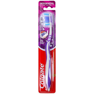 Colgate Zig Zag Medium tandbørste er designet til daglig tandpleje og hjælper med at rense tænder, tandkød og svært tilgængelige områder i munden. De zigzag-formede børstehår bidrager til en grundig rengøring mellem tænderne, mens det ergonomiske håndtag giver et godt greb under tandbørstning. Søgeord: Colgate Zig Zag, Colgate tandbørste, medium tandbørste, tandbørste til daglig brug, tandpleje, mundhygiejne, rengøring mellem tænder, manuel tandbørste.
